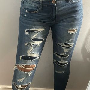 Skinny fit dark blue ripped jeans